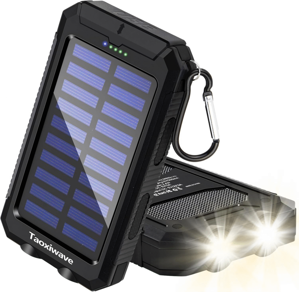A rugged solar power bank with a carabiner, designed for outdoor use, featuring solar panels and LED lights.