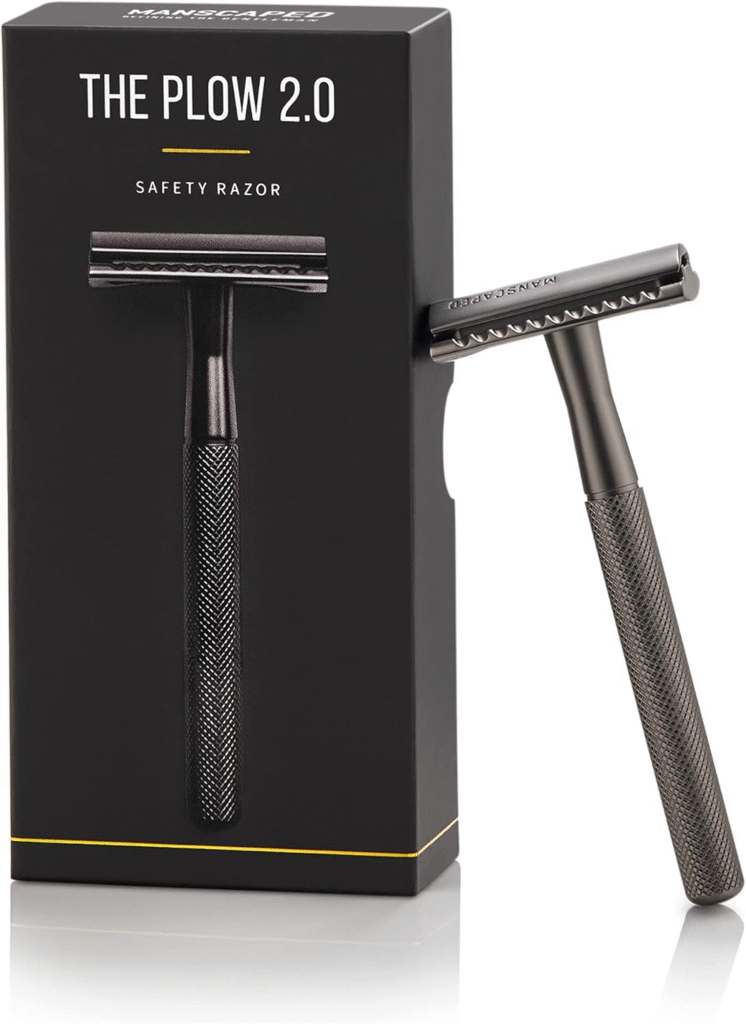 Black safety razor with a textured handle, packaged in a sleek box labeled 'THE PLOW 2.0'.